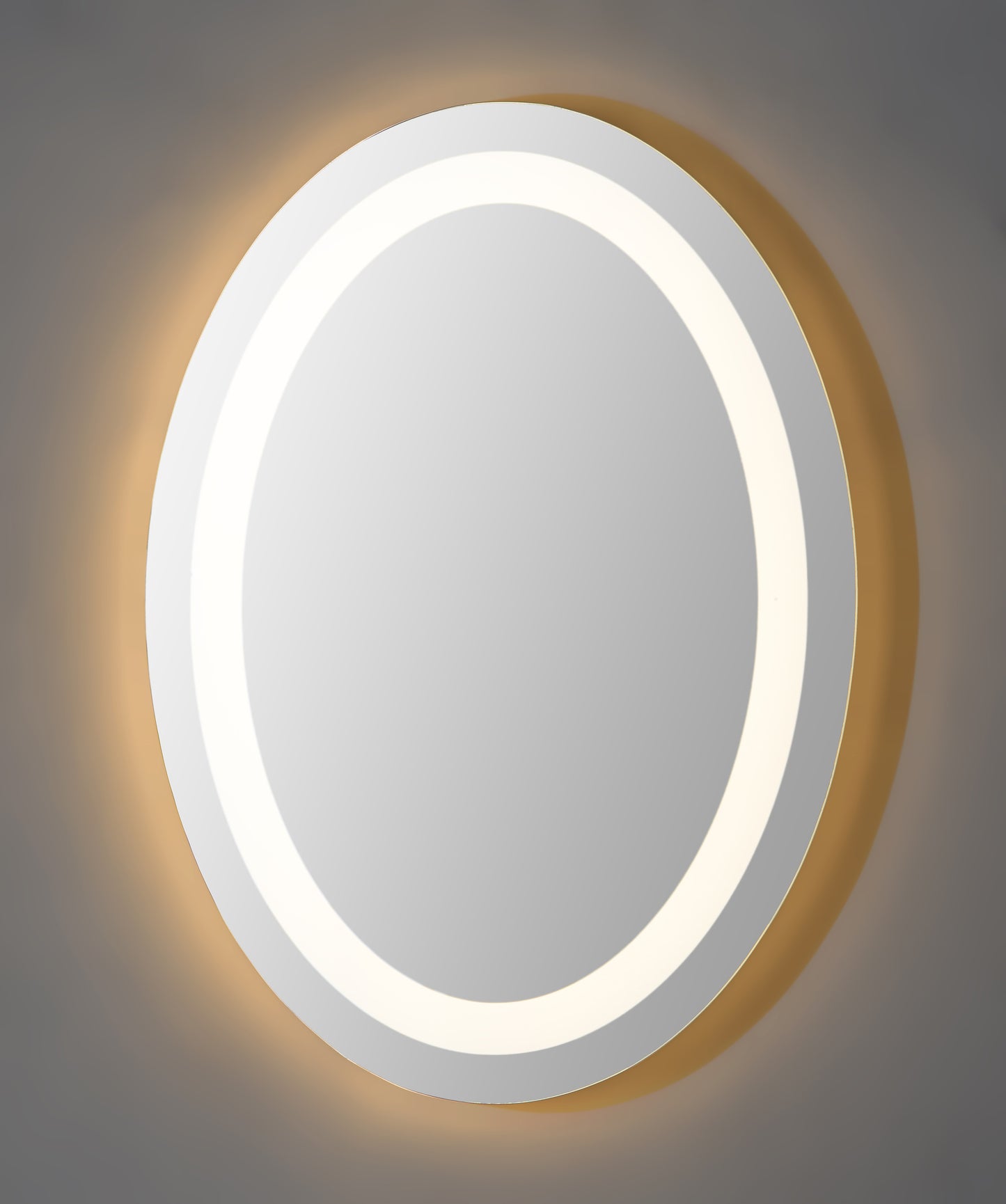 Oval shaped frame less backlit mirror.